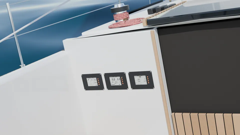 Render: three SailNav displays flush-mounted on the port bulkhead beside the companionway of a heeled keelboat